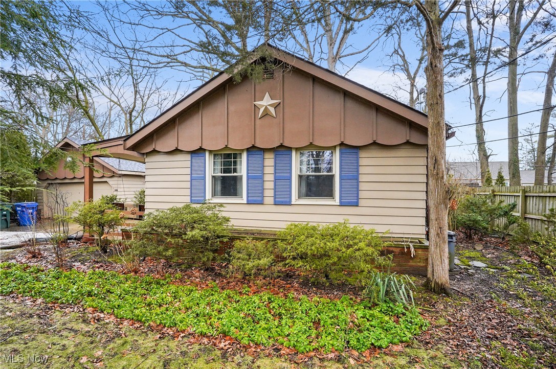 10189 Colfax Dr Columbia Station is a 3-bedroom 1-bathroom Cottage like looking home. The current owner has lived in this house for over 40 years and has enjoyed the friendly neighbors and sense of belonging while there. Overall, the street is quiet with minimal traffic. Some features the owner likes the most are the side porch, which overlooks the driveway and many plants & shrubs the yard has coming into bloom in the warmer months. With one floor living it has been easy for her to get around and raise her family who now have their own homes. Although there is no central air the owner has shared a window unit is adequate and states the trees and shade of the lot help keep the home cool during those warmer days. There are three bedrooms off the family room and a front door which leads out to the covered porch. There is also another door off the porch leading into the kitchen. The main bathroom has a jetted tub for relaxing after a hard day of work. The kitchen comes with appliances including a refrigerator, microwave, ceiling fan, stove and built-in cabinets for storage. There is also a pantry closet in the hallway. Outside in the yard there is a two-car detached garage with plenty of space for keeping your toys and household items. Another great feature is the fully fenced in dog area directly behind the garage along with another fenced area to enclose the backyard. The backyard wraps around the rear of the home. In the front yard there is a nice setback from the road compared to others on the street. The roof is under 10 years old, Furnace is under 5 years old, water tank is 5 years old, blown insulation in walls and under whole house is 5 years old, and sewer line replacement to street. Within a short distance drive there is endless outdoor exploration at the Mill Run Metropark down Valley Parkway, Cleveland Hopkins Airport just north, endless restaurants around Strongsville, and Cuyahoga County Fairgrounds which host many events throughout the year.