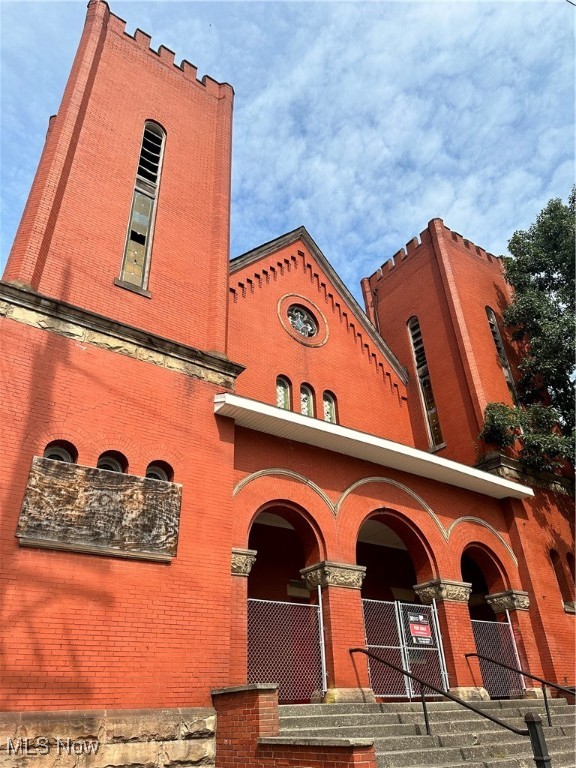 Look at this remarkable 124-year-old church in the vibrant Tremont neighborhood. This historic brick building is filled with potential and is perfect for various uses such as an artist colony, trendy restaurant, unique residential space, or spiritual haven. The property has been recently upgraded with new toilets, well-maintained furnaces, fresh ceiling tiles, plumbing fixture repairs, brand-new electric panels, roofing repairs, and more. This is an AS IS sale. This space provides a perfect blank canvas for your creative ideas to come to life within these remarkable walls.