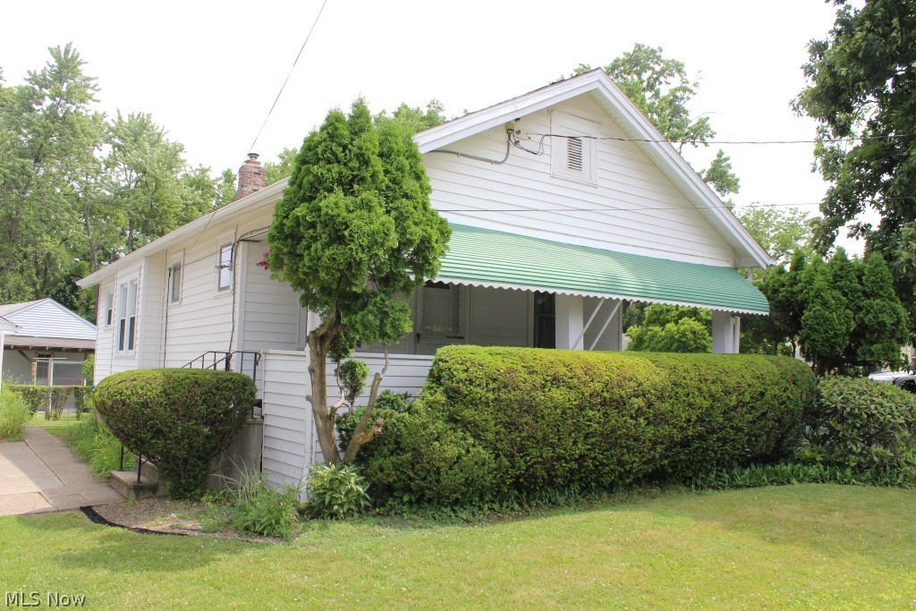 Absolutely adorable 2 bedroom, 1 bath ranch with so many updates, pretty neutral décor and meticulous* Updates include shingles, chimney & kitchen (2008), carpet, bathroom & most windows (2009), central air & thermostat (2010), front & back door (2008), electric service box & insulation (2006)* Living room with crown molding, fan & electric stove* Formal dining with crown molding, fan & window seat with drawers* Master with fan & walk in closet* Kitchen with ceramic back splash, range, refrigerator & microwave* Bathroom with Swanstone tub surround & counter top with molded sink & ceramic floor* Unfinished basement with glass block windows & waterproofed* Detached 1.5 car garage (16x20) with opener* Covered front porch* Spacious corner lot* Seller's approx. utilities- gas budget $39, electric $30, water/sewer $55* Nothing to do but move in! Great value!