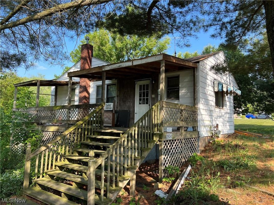 Cozy home on a private lot in Canton South School district! Enjoy sitting on the deck tucked away in nature. This ranch features hardwood floors throughout. Three bedrooms, a full bathroom, eat in kitchen and living room on the first floor. The lower level has a walk out basement with sliding glass doors and potential to make it a finish basement for extra living area. Plenty of storage and attached garage. The half acre lot is completely private and perfect for gardening or just relaxing. Needs TLC but has tons of potential! Selling AS-IS. Call to schedule your showing today!