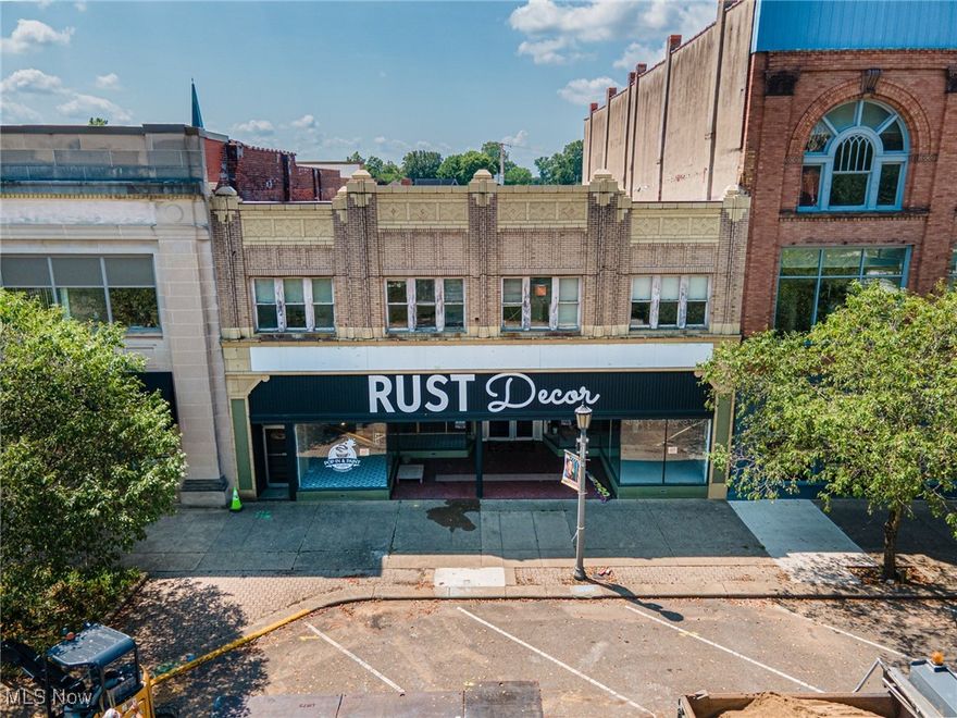 This property will be sold at LIVE ON-SITE AUCTION on Saturday, February 14th at 10:00 am. This expansive, move-in ready former retail store offers over 10,000 square feet of main-level floor space, plus nearly 10,000 square feet in the basement—including approximately 800 square feet of dedicated office space. The second-floor features more than 3,000 square feet and is divided into 2 four-room suites and 4 two-room suites, with a total of 2 bathrooms. This area could be ideal for office use, residential conversion, or short-term rental opportunities like Airbnb with a fantastic view of the courthouse square. SIGNIFICANT updates since 2023 include new roof with 20-year warranty, new electrical, new plumbing, and lighting upgrades. Noteworthy, there is a furnace valued over 10k with gas line ran to the second story. Additionally, there is a newer water heater installed in 2018. Main floor Kitchen equipment and front counter will convey to the new owners at a successful closing. Don't miss out on this versatile commercial property, filled with income producing potential—schedule your private showing today! Contact a licensed real estate agent for a private showing.