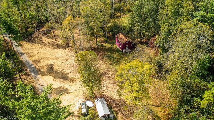 A great opportunity to own a tract of recreational property in an area that is widely known for trophy whitetails. A nice cabin is already in place for your hunting and outdoor adventures. A selective timber harvest has recently been done, so there are really nice trails throughout the property and the terrain is easily accessible. A great mix of pines and hardwoods, as well as some open areas ready for your food plots. Oak Ridge elevated hunting blind and several food plots have already been added to the property. This property is only minutes from Newcomerstown and SR 77. If property sells in parcels it is subject to final survey for acreage totals. Immediate hunting rights granted to buyer with the receipt of the 10% downpayment.