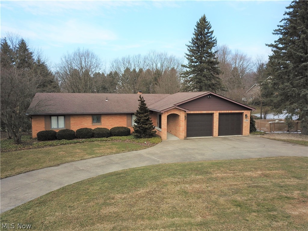 Welcome to 375 Pres Vannes Drive; a 4 bedroom, 2-and-a-half bathroom brick ranch in Dalton. This beautiful home has a lot of character and is sure to please you! When you step into the living room, you'll immediately be drawn to the hardwood floors and the bright, natural light that shines in through the plentiful windows. With the gorgeous wood cabinets and a ton of cabinet/counter space, the eat-in kitchen is a place you'll enjoy spending time in. A bonus living room offers a fireplace, making the room extra cozy. Bedrooms are all a nice size. Partially finished basement has a second fireplace. Full bathroom in basement and outdoor access make the basement a great place to entertain. Step outside to see the immaculate wooden deck with 3 levels -- it's very unique and very pretty. You'll want to host get-togethers with friends or family-- no doubt! Wide stairway from the deck leads to the large, flat backyard, which has a storage garage. Neutrally decorated throughout, this home is r