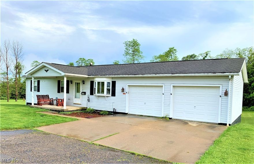 Perfect ranch home on a sprawling lot! Upon entering the home, you are welcomed into a large family room with an open floor plan flowing into the dining room. Off the dining room you will find an outstanding kitchen boasting newer stainless steel appliances:) You can also slide open the doors from the dining room and head out onto a MASSIVE back deck, perfect for barbecues or enjoying those summer evenings relaxing with the family watching the squirrels, rabbits, and occasional deer that stroll around the yard. On the main floor you also have 2 charming bedrooms and a fabulous bathroom with a huge step up tub. Downstairs you will find the most amazing rec room, another full bath, and the laundry area. This home has tons of storage space and also has a 2 car attached garage on the main floor, entering into the dining room/kitchen area. Sitting on almost 2 acres, this one will not last long! Call your favorite Realtor and schedule your showing today!  Home warranty being offered to buyer