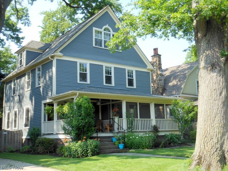 Get Ready to Fall in Love with this Coventry Village Century Colonial!  Totally remodeled in the late 90's when the 3rd Floor Master Suite was created adding another 450 SF to the original, preserved footprint.  Hardwood Floors, Natural Woodwork & Fashionable Decor Thruout. Beautiful Pocket Doors at entry to the Formal Dining Room.  Maple, Granite, Stainless, Ceramic Features and Textures in Eat-In Kitchen that has a great view & Access to Deck & the Rear Yard. Wonderful Screened Front Porch & Open Porch Entry. Original Master BR with FP on 2nd floor is now used as a Family Room. 3 More Bedrooms on the 2nd floor plus a Remodeled Full Bath & Huge Linen Cupboard.  Spectacular 3rd Floor Master has His & Hers Walk-in  Closets, a Reading Nook, and Vaulted Ceiling & Skylight in the Double Shower Bath.  Central Air was added in 2008, the Boiler was replaced in 2007, the Exterior was painted in 2012, Porch Roof was replaced in 2009. Lovely Fenced Back Yard & 2 Car Garage. Near By Coventry Shop