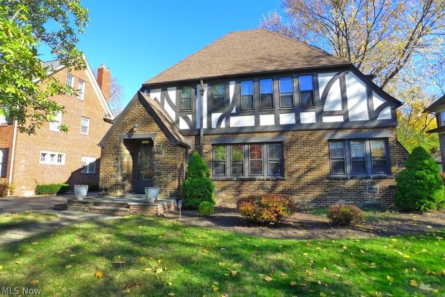 Spacious & Pretty brick Tudor located on a popular block of Warrington in Shaker Heights. Large lot with awesome Sun Room that overlooks the garden! Stunning circular staircase and architectural details throughout including beautiful hardwood floors. Updated Eat-In Kitchen. Family room on first floor plus screened sun porch. Updated roof, storms, screens and landscaping. 2 car detached garage with garage door opener & newer garage floor. House has been freshly painted! Seller offering a one year home warranty. Great value! Tri-school area close to high school, Woodbury & Lomond school. Easy commute to downtown, hospitals, universities and University Circle.