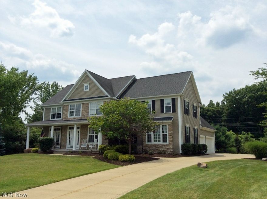 Location-location! Quality custom built by Northcoast Builders on dead-end street. Close to interstate, downtown shops and schools.  Exciting floor plan with spacious fireplace in the family room open to the kitchen for entertaining. Extensive hardwood flooring, two story foyer, kitchen with cherry cabinets, island, double oven, all stainless steel appliances, granite counter tops, first floor laundry room, bedroom with full bath and formal dining room with custom molding, all on the first floor.

The second story offers a large private master suite (19X14) with vaulted ceilings, fireplace, sitting area, two walk-in closets and master bath.  The remainder of the second floor has three additional spacious bedrooms with spacious closets and two full bathrooms.

Attached to the home is a spacious three car garage.  Home has a central vac system and monitored alarm system.  A MUST SEE.... WON'T LAST LONG!