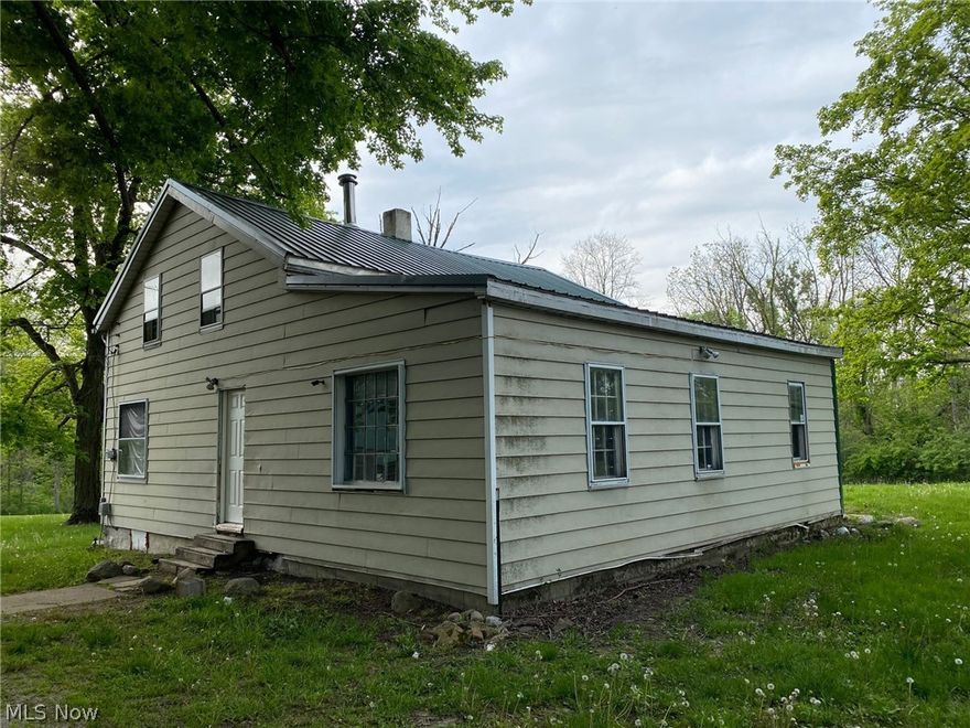 Looking for some acreage in Black River School District?  This home is located on a dead end street with over 2 and a half acres.  The home is a fixer upper and waiting for your new design ideas.  If the undertaking of rehabbing this home is to much you could always tear it down and build your dream home.  Lot is next to nature reserve.  The 3 car detached garage has electric and concrete floor.  Main floor has living room, eat in kitchen area, bathroom, first floor laundry and large room that could be a bedroom.  Upstairs features 3 bedrooms.  Home is being offered in first look initiative from Freddie Mac for the first 20 days on Market. Home is being sold AS IS seller will not do any repairs to the property.  Call agent today to learn more about this home.