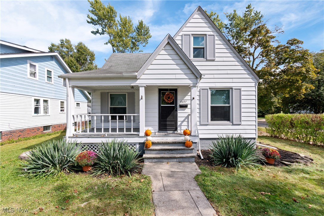 Welcome to this charming and updated 3 bedroom, 2.5 bathroom bungalow with a 1 car detached garage situated on a large corner lot. The eat in kitchen has been updated with granite countertops, white shaker cabinets, and stainless steel appliances including a new dishwasher (all stay with the home). The living room features wood floors and includes etched glass windows as well as a white washed decorative fireplace. First floor has two bedrooms separated by an updated bath with tile surrounding a large tub, vanity and toilet with bidet. Head upstairs to the large primary suite with built in closets and a full bathroom with fully tiled shower, nice vanity and toilet with bidet. The basement is half finished into a rec room but still leaves plenty of storage area including the laundry room (washer and dryer stay) and a half bathroom. Vinyl windows throughout the home. The backyard is huge for the area, partially fenced, and has plenty of room for large gatherings or fall fire pit parties. So much to offer for the price. Call today to see it before it is gone!