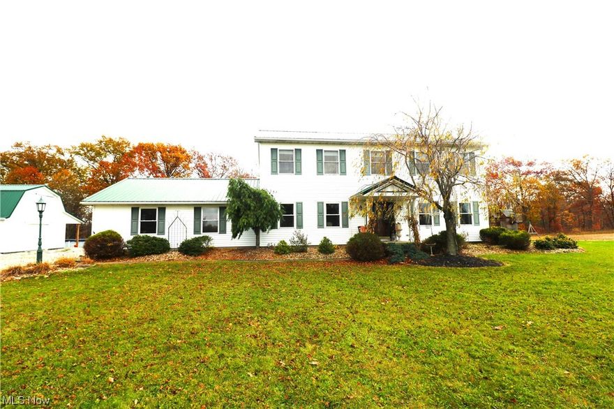 Country Paradise w/ approximately 300' of Huron River Frontage! This cozy 3 bed, 2.5 bath home sits 275' off the road on nearly 3 acres w/ gorgeous wooded backdrop. Grand foyer, adorned w/ custom painted walls. Kitchen w/ island boasts Granite Counters, Tiled Backsplash, Oak Cabinets, Island & Eating Nook. Formal dining & large living room flood w/ natural light. Main floor features newer laminate flooring & windows. Upstairs, you'll find spacious bedrooms, w/ master suite offering a 13x4 walk-in closet & 13x9 ensuite bath complete w/ a double vanity & whirlpool spa. New carpet in bedrooms ('23).Upstairs landing, ideal for an office/sitting area. Partially finished basement provides additional living space & storage. Enclosed porch & composite deck offer tranquility for your morning coffee. Best of all the outdoor space features a 40x32 Barn w/ Loft & Heated Floors, Shed, Pool, Stone Patio w/ Firepit Area & Pergola Swing. Don't miss out on this exceptional property!