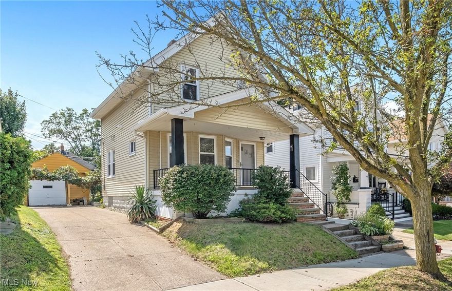 This beautiful home at Lakewood's west end sits on a dead-end street near Metro Parks and local amenities like coffee shops, gyms, grocery stores, RTA, Old River Shopping, and restaurants. It offers an open layout, abundant natural light from large windows, hardwood floors throughout, a roomy formal dining room, bay window in the living room, spacious master bedroom with extra windows, and a relaxing front porch. Full bath with claw tub adds character. The lower-level rec room has nature stone flooring and plumbing is available for a potential second bath near laundry area. Nature lovers garden area next to garage. Recent upgrades include a new retainer wall (2023), water tank (2024), garage paint (2024), and interior paint (2025). Schedule your private tour today.