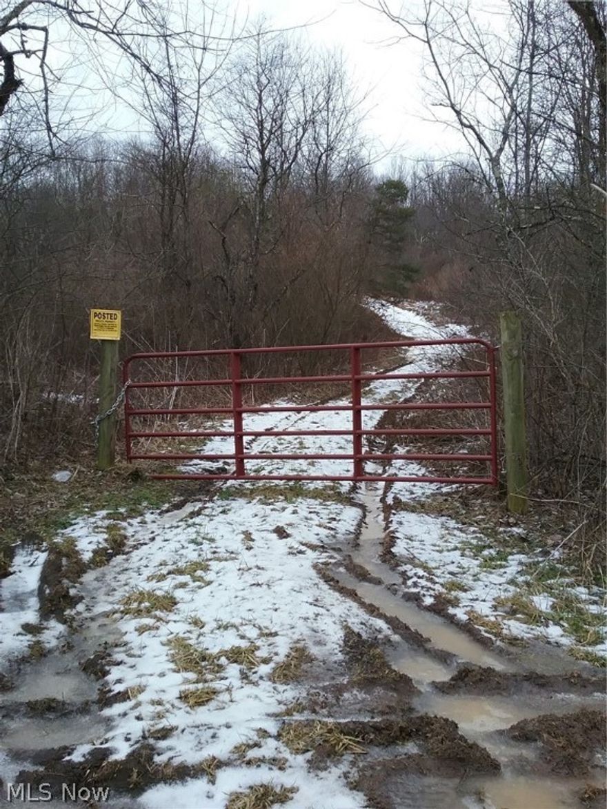 Great piece of gated hunting property with Big Bucks to be taken, adjacent to Hopedale Sportsmans club. There is approximately 2767 feet of road frontage on this 59+ acre tract with easy access from Dump Rd either from Untionvale or Hopedale.  Some potential building sites on property as well. All surface rights owned by seller transfer to buyer.  Seller is motivated to move this property.  
Powerline easement runs the depth of the property.