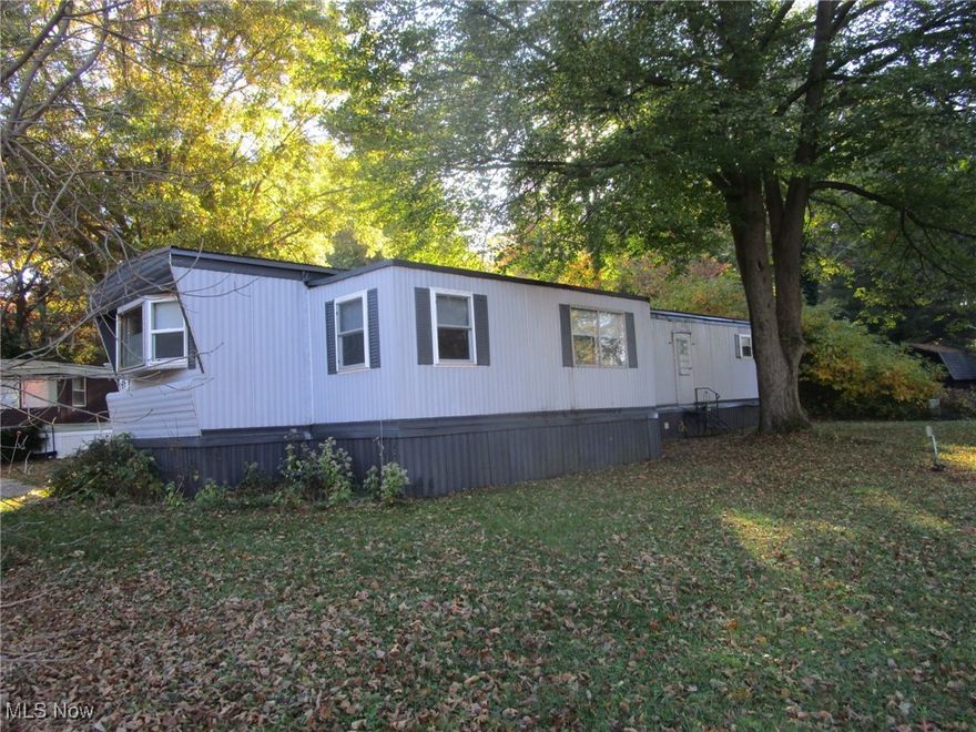 Call your Agent !! Super clean, well maintained and move in ready! Don't miss this 2 bedroom mobile with an adorable kitchen, breezy sunporch, BIG living room and nice dining area - all on one floor - all on a quiet shady lot.  The sellers have installed all new floor coverings in October of 2025, added a new 60 amp electric breaker panel and are including the kitchen appliances. Extra storage is provided by the handy linen closet, pantry in the kitchen and built ins in the smaller bedroom.  Taxes are unbelievably low, at 39.00 per year, and the 8 x 8 shed is included. Parkwood Village offers a clean, well kept park with a peaceful rural vibe. Wind through the curving streets, past the tranquil pond with its floating geese and enjoy the mature trees scattered throughout. This spot is just minutes from Route 11, Route 84, shopping, fine dining, Lake Erie, historic Bridge Street, medical facilities, parks, beaches, wineries and more. Management must approve all buyers in this established 35+ years park. Ask your Agent for the forms, rules, regs, etc that are provided in the supplements section. Current rent is 259.00 per month. See the supplements for charges for pets, and discounts for seniors, in the supplements section.There are a few pet restrictions.  Residents pay their own water, sewer, heat, electric and trash. Residences must be owner occupied; no renting, leasing or sub-leasing is permitted.This is a 1973 Schult, Model 60, Title # 0401512134, Serial # 124728. No cash? Need a loan!? The Listing Agent can provide contact info for a few potential mobile home lenders - have your Agent reach out!.