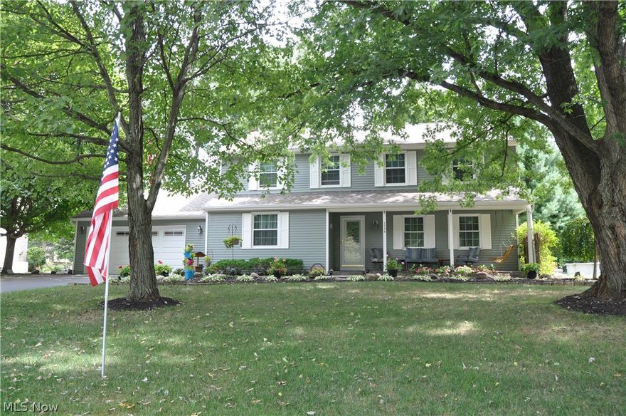 Exceptional 4 bedroom, 2.5 bath family home w/remodeled kitchen, Corian counters & laminate flooring, formal living & dining rooms, stunning family room w/gas fireplace, spacious bedrooms w/great closet space, large deck overlooking patio & lovely back yard. New roof, windows, garage door & water heater. Must see - immaculate condition!