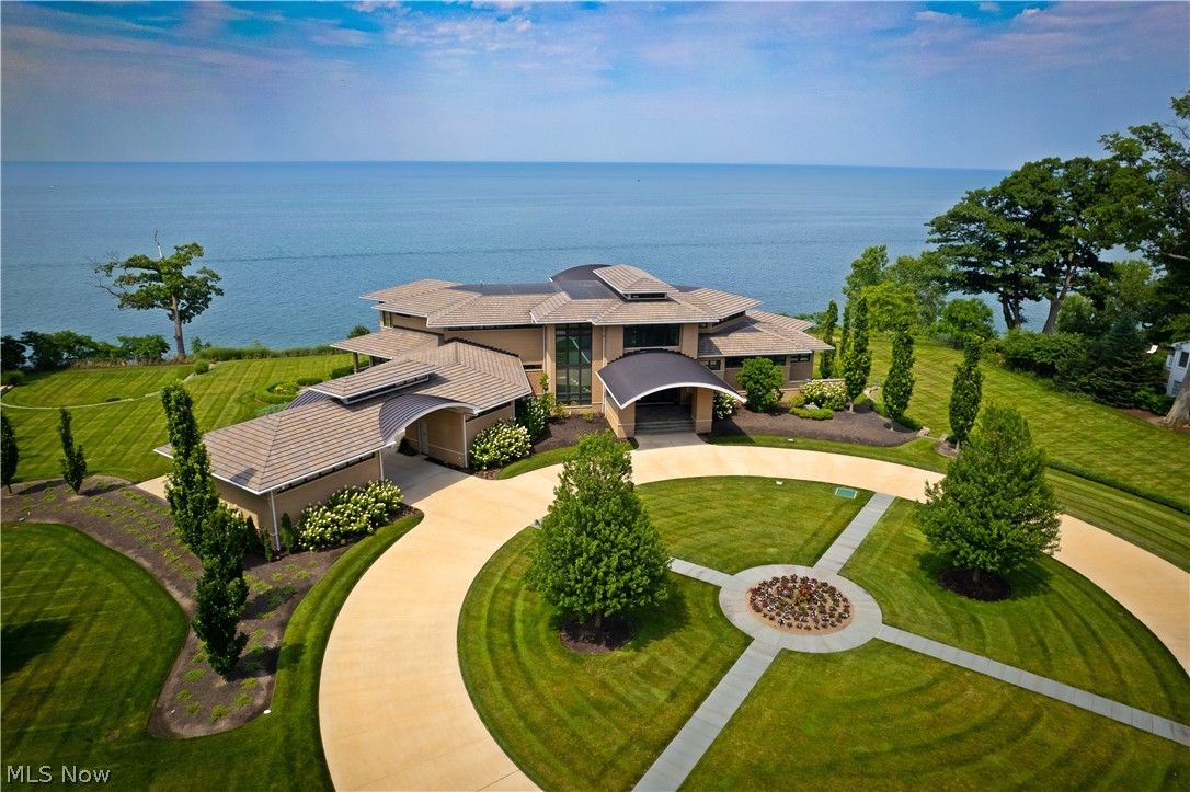 This exceptional lakeside residence represents unmatched luxury, meticulously crafted with the finest materials and enhanced to surpass industry standards. A testament to visionary ingenuity, this masterpiece, built by an owner with an innovative mind and a history of many astonishing inventions, stands as the benchmark of superior quality in the real estate market. For those seeking the pinnacle of waterfront living, you're truly fortunate to call this home yours—an extraordinary opportunity awaits. Additionally, the option to purchase two adjacent lots further amplifies the potential of this remarkable property. Notably, the heated driveway adds to the allure of this impressive estate.