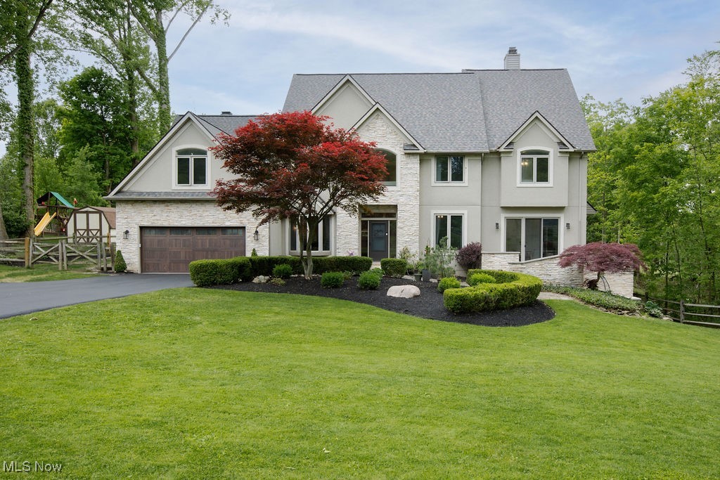 Experience Refined Living in this Stunning 5-Bedroom Retreat on 3.35 Acres in Kirtland! Discover the perfect blend of comfort, style, and privacy in this well maintained 5-bedroom, 5-bathroom home set on 3.35 tranquil acres in the heart of Kirtland. Designed for both everyday living and effortless entertaining, this spacious residence is move-in ready and full of charm. Inside, updated hardwood floors and expansive picture windows create a bright and welcoming atmosphere, seamlessly connecting the interior with the surrounding natural beauty. The open layout provides an ideal space for gathering, relaxing, or simply enjoying the views. Upstairs, five large bedrooms await, including a serene primary suite complete with a two-sided fireplace—an elegant touch that adds warmth and sophistication. Every bedroom offers generous space, ample storage, and abundant natural light—perfect for families of all sizes or multi-generational living. The finished walkout basement features a full bathroom, and multiple flexible-use rooms—perfect for a home gym, office, media room, or guest accommodations. Outside, immerse yourself in the peacefulness of your private wooded property—ideal for hiking, gardening, or quiet evenings surrounded by nature. This exceptional home also boasts numerous recent updates, including a new roof (2021), remodeled kitchen and primary bath, new carpeting (2024), updated hv/ac, and much more. Don’t miss the chance to make this dream home yours—schedule your private showing today!