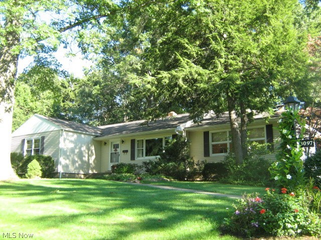 A rare find! Lovely vinyl-sided home with spacious fireplaced family room that was once used as an additional living suite. Built-in shelving and storage cabinets throughout. Desirable backyard, beautiful flower gardens. Partially covered deck. Share of Crystal Lake stock. Vinyl siding and roof 2009, furnace 2010 and A/C 2004.