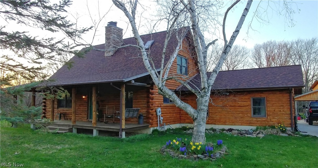Quality log home on 4.5 acres overlooking Mill Creek! The floor to ceiling stone fireplace anchors a living room with soaring vaulted ceilings. The unique open floor plan on the lower level includes a dining room / kitchen combination with built in appliances. The door from the dining area opens to a spacious deck overlooking a large back yard with an above ground pool and storage shed. The loft at the top of the stairs is a great flex space suitable for many purposes. The huge master BR has vaulted ceilings, wood floors, double closets and an on suite bath. The full poured wall basement includes a full bath and a 3rd bedroom. The walk out feature is a convenient way to move possessions and provides additional safety. The large open area here could easily be converted to an additional living space. In addition to the 2 car attached garage there is a 24x40 garage/barn built in 2015. The wood board and batten siding on this building coordinates beautifully with the log exterior of the home. The large concrete pad in front is ideal for campers, boats or a recreation area. This unique lot shares 1,500+ feet of frontage and includes full portions of Mill Creek.