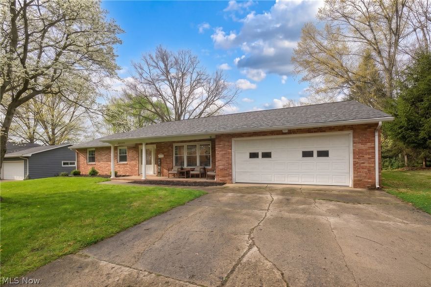 Your front-row seat to one of the best of the community has arrived! Perfectly positioned just moments from Crater Stadium, this stunning brick ranch is the ultimate companion to its famous "Brick House" neighbor. Set on a sprawling 0.44-acre lot, this home places you right in the center of local pride, offering the perfect blend of classic brick charm and modern-day luxury. You’ll love the convenience of walking to games, and on those crisp autumn evenings, you can host the ultimate pre-game tailgate on your 2023 concrete patio, enjoying the atmosphere of Friday Night Lights and the distant roar of the crowd as the stadium comes alive. The interior is a dream for those who love to entertain, offering three distinct living spaces to spread out. Guests can gather in the bright, formal front living room, or hang out in the secondary family room located right off the kitchen for a more casual vibe. The heart of the home is the kitchen, fully renovated in 2020 with sleek grey cabinetry, updated countertops, a subway tile backsplash, and all appliances staying for the new owner. If you need even more room for the big game, head downstairs to the basement living area, which was finished in 2024 with new drywall and flooring to create the perfect media room or "fan cave." For a quieter moment, the enclosed sunroom offers a seamless transition to the incredible backyard. The main level also features fresh paint, updated lighting, and new flooring throughout, along with a brand-new bathroom and high-efficiency ProVia doors and windows installed in 2020. Practicality meets luxury with a long list of major upgrades, including a brand-new AC from 2025 and a new roof being installed this month. With the washer and dryer included and an attached 2-car garage, this home is truly turnkey. Don’t miss your chance to own this stylish, updated gem in a prime location that puts you right in the heart of the action.