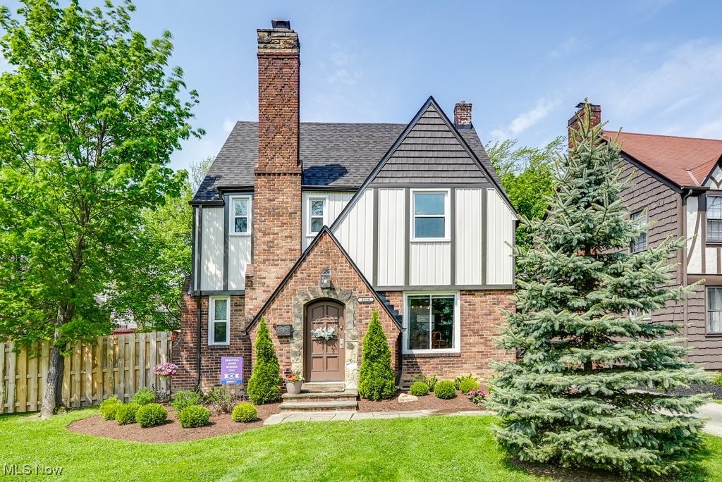 Incredible opportunity to own this 2024 Beautiful Home Winner in a highly desired neighborhood in University Heights. Take in the beautiful new landscaping pulling up to this Tudor style home on its spacious, and newly fenced-in, double-lot. Almost every inch of this home has been updated, both inside and out, so you can move right in with confidence. Enjoy brand new siding, upgraded insulation, new furnace & AC, new energy efficient windows and a new roof with seamless gutters for both the home and garage. The upgrades continue inside on the first floor, featuring a kitchen with new stainless-steel appliances. With a great layout for entertaining friends and family, the kitchen is open to a large dining space just off the living room boasting gorgeous hardwood floors. The carpeted family room has access to the private backyard with a great stone patio and plenty of fenced-in yard space to enjoy. A convenient half bath and a waterproofed, partially finished basement add extra functionality. Upstairs, you'll find three generously sized bedrooms, each with new ceiling fans, and a full bathroom with a shower/tub. The third level has the 4th bedroom, a large master with plenty of closet space and a thoughtfully renovated master bathroom. Additional features include a generator, smart house with alarm system & thermostat, updated light fixtures, new back door and garage door. Bonus: this home is also available to be purchased fully furnished! Schedule your showing today and don't miss your chance to see this exceptional award-winning property!