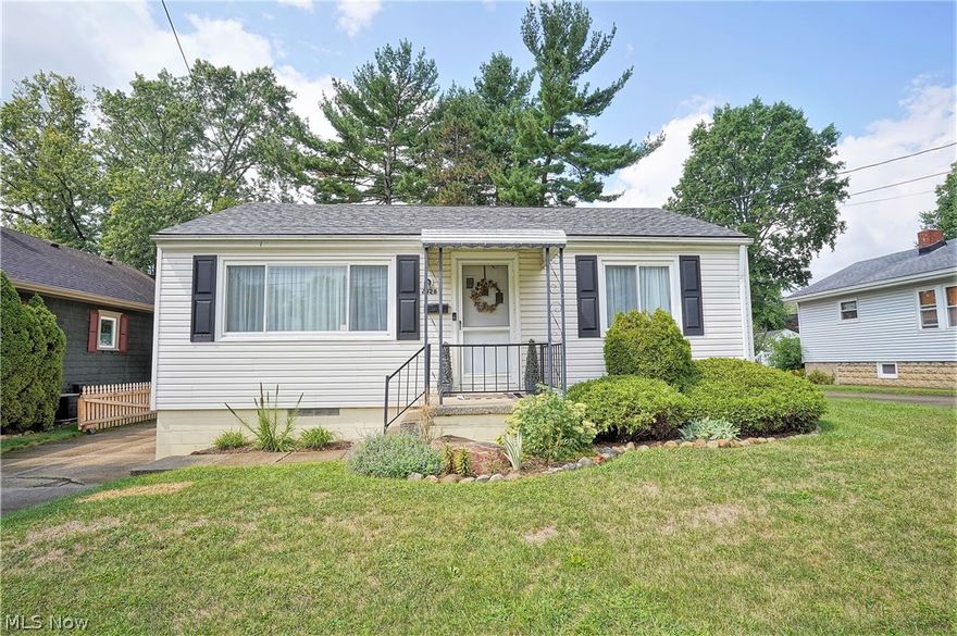 Beautifully updated ranch is super nice and offers an open floor plan!   Spacious living room leads you to the huge, updated kitchen featuring plenty of cabinets and granite counter space - all appliances convey. The two bedrooms are good size and are separated with a full bath.  The lower level features a recreation room, 2nd full bath with walk in shower and an extra room, currently used as a 3rd bedroom; however, could be an office or exercise room.  The backyard is totally fenced in and there are 2 nice covered patios to enjoy the seasons.  The swing set even stays!