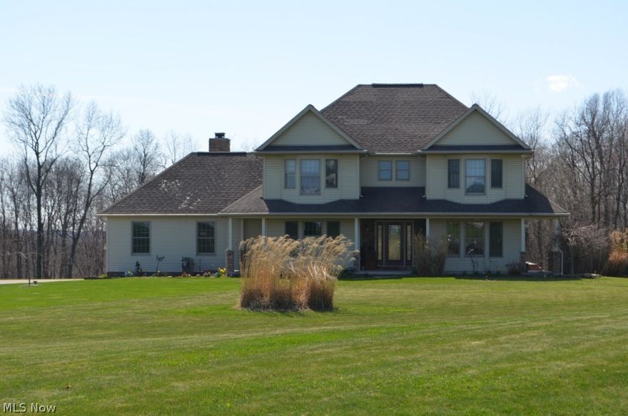 Quality and attention to detail are evident in this stunning custom home just minutes from WHHS. The home features hardwood cabinets, trim, doors and custom built-ins. This smart floor plan includes a comfortable eat-in kitchen with wood flooring, an island with an additional sink, a large pantry and is open to the living room and sun room with access to a large composite wood deck; perfect for indoor and outdoor entertaining. The deck area includes a private hot tub area. The sitting room off the kitchen could serve as a formal dining room. The upstairs has 4 bedrooms, complete with large, private, master bath. Full, semi-finished, walk out basement has a fun family room/game room/workout room combo. Several rooms in the basement have shelving installed for additional storage. The exterior grounds feature open and wooded acreage with plenty of room for 4H projects.