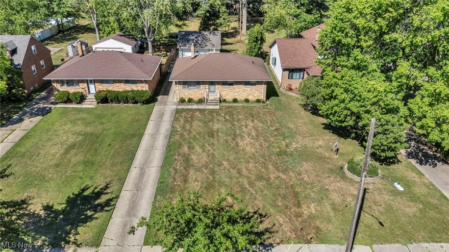 A brick ranch with more to offer than meets the eye. This Euclid gem blends the ease of single-level living with surprising space to spread out. Three bedrooms and two full baths anchor the home, while a generous living and dining area flows seamlessly into the expansive kitchen. Downstairs, a full basement with its own bath unlocks endless potential—whether it’s a home gym, playroom, or second living space. Outside, nearly half an acre invites gardens, gatherings, or simply room to breathe, complemented by a detached two-car garage. With updates like a newer roof and A/C already in place, comfort comes built-in. Minutes from Lake Erie, parks, shopping, schools, and freeway access, it’s the perfect canvas for the next chapter of home.