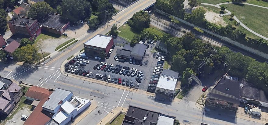 Don;t miss this opportunity to purchase this unique piece of property.  Just over 1 acre situated on Lorain Ave. between W53rd and W55th in the Detroit Shoreway Neighborhood.  Office Building/Commercial Service Garage with separate retail storefront and 2 residential apartments.  Redevelopment Opportunity!  Great location just west of downtown Cleveland.