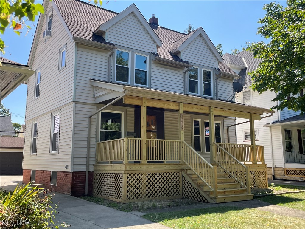Don't wait to see this amazing colonial in western Lakewood. Enjoy the newly built front porch, where you can relax while meeting the new neighbors. Enter into the large living room complete with traditional Lakewood built-ins and woodburning fireplace. The living room is open to the large dining room, perfect for entertaining with its leaded glass window, traditional chandelier and feature wall for a world traveler. Both living room and dining room have beautifully restored oak moldings and wide baseboards. The original hardwood flooring is under the carpeting. The eat-in kitchen offers ample storage including a pantry, and all appliances are included.
On the second floor, the restored linen cupboard will stand out to you as the mark of a quality Lakewood home. There are three large bedrooms, all with large closets and ceiling fans. Two have carpeting over the original hardwood, and one has the hardwood exposed. The updated bathroom features a tiled floor, built-ins, and a jetted tub.
Your bonus space is on the third floor. Will it be a future primary suite, a media room, playroom, or an office? You decide.
The basement offers a laundry room with appliances, a workshop with built-ins, entertaining area, and rough-in plumbing for a half bath. Furnace and air are just a couple years old.
Out back is an entertainer's dream, complete with patio, fenced yard, fruit trees, and a two-car garage.
If you wait on this one, you'll miss it!