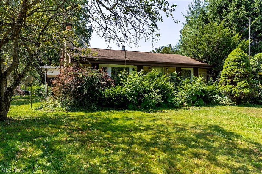 Welcome to your family vacation spot! Continue the memories of the 2 previous generations,  Large living areas with 2 kitchens, 2 baths, 2 dedicated bedrooms with the ability to sleep many more. Enjoy the large vaulted family room, or dine in the screened in porch.See the lake from your front yard. Launch your boat across the street and have plenty of yard to park your boat trailer, or inquire about available dock space.