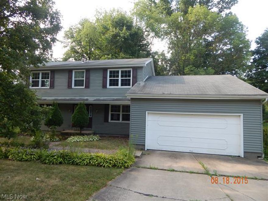 Attractive tradition 2-story with a 1/2 acre wooded lot, large living room, formal dining room plus dinette area, family room with fireplace and slider to rear patio, updated kitchen cabinets, 4 large bedrooms including master with master bath.  Equal Housing Opportunity.  Sells As Is.