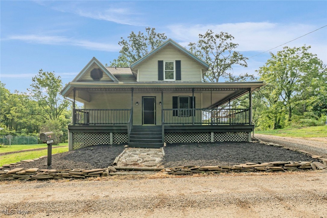 Looking for a quiet street and a serene setting to call home? Then this 1 1/2 story home situated on 1.36 acres is for you! The charming wrap-around front porch with two entrances allows you to enter through the living room or dining room. The kitchen with granite countertops & range, refrigerator (2023) and dishwasher (2023), updated full bath and newer LVT flooring throughout complete the first floor. All three bedrooms are housed on the second floor with a second full bath. Enjoy peace of mind with a new furnace and central air conditioning system installed in 2023.The metal roof was also newly installed in 2023, and the shingled roof is approximately 6 years old. Call to view soon!