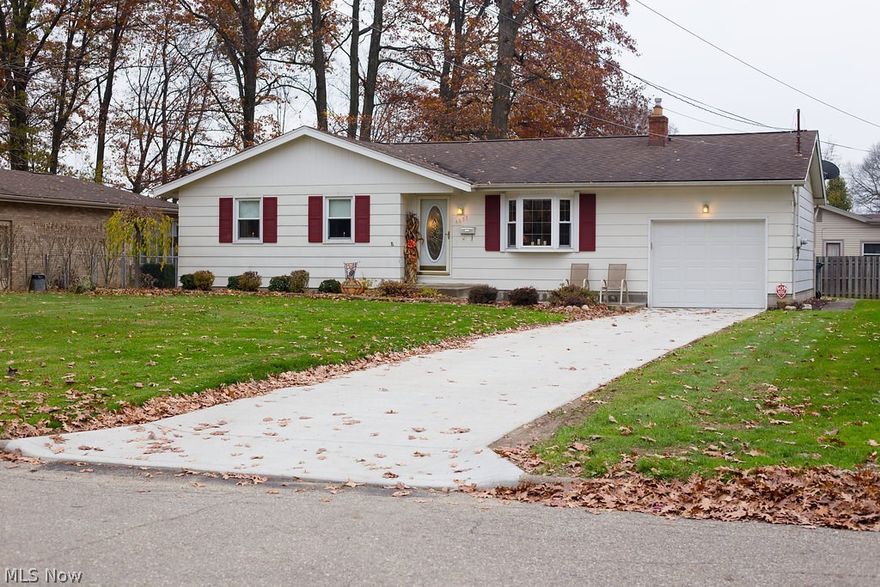 Don't miss the three bedroom ranch with finished basement with additional full bath.  Updates include newer windows, newer furnace and central air, new bay window in living room, newer roof, newer front steel door and glass storm door, security system.  Kitchen has been remodeled, new carpet, ceramic tile, paint.  New microwave, refrigerator, stove and dishwasher in 2006.  Home Warranty Included!