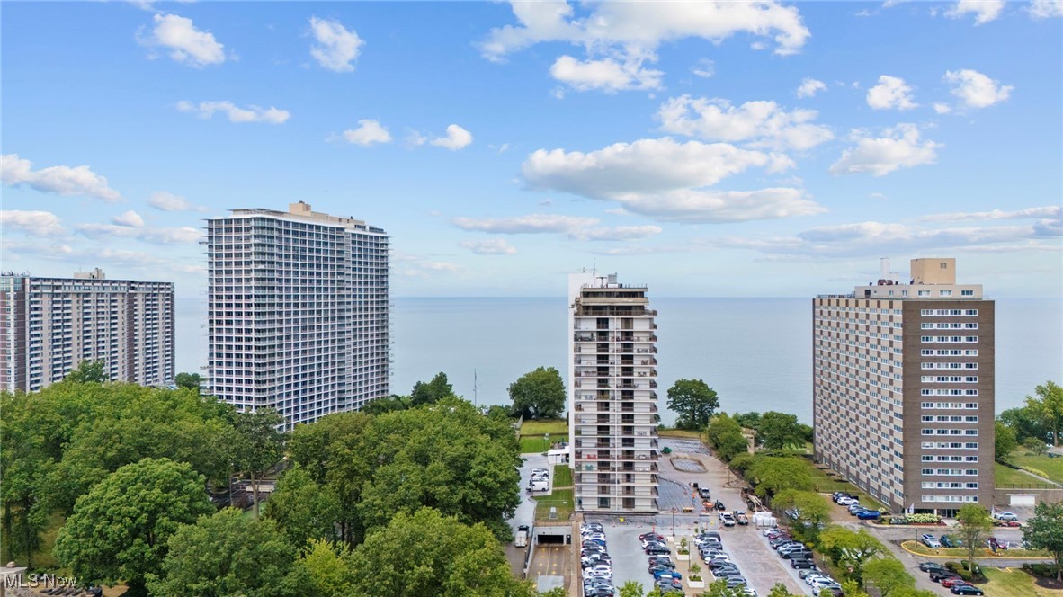Discover the best of lakefront, maintenance-free living in this move in ready two-bedroom condo with breathtaking views of Lake Erie. The spacious living room flows effortlessly into the dining area, where sliding glass doors open to a private balcony—an ideal spot to entertain or simply unwind while soaking in the serene waterfront scenery. The beautifully designed kitchen features warm cabinetry, granite countertops, stainless steel appliances (all included), and a breakfast bar that creates the perfect gathering space while preparing meals. The owner’s suite offers a spacious retreat with a sun-filled window, walk-in closet, a linen closet, and a private bath with a walk-in shower. A second bedroom and full bath provide comfort and convenience for family or guests. Additional highlights include an assigned parking space in the heated garage, a storage locker, and the Meridian’s impressive amenities: indoor and outdoor pools, a first-floor party room with a full kitchen, a game room, and a lower-level entertainment space. Laundry facilities are also conveniently located on each floor. Perfectly situated just minutes from Lakewood Park, Edgewater Park, and all of Lakewood’s vibrant shops, restaurants, and attractions—plus only a short drive to Downtown Cleveland—this condo offers a rare opportunity to enjoy luxury high-rise living on the lake. Schedule your private tour today!