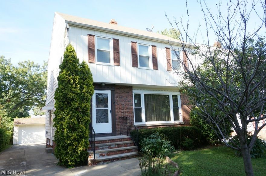 Updated 3 Bedroom, 1.5 Bathroom Brick and Aluminum Colonial.  CHECK OUT THE 360 DEGREE VIRTUAL PANORAMIC TOUR!!!  Freshly Painted in Fun Neutral Colors & Newer Carpet Throughout.  Bright & Light Living Room with Built-in Shelves, Dining Room with Chair Rail, Two Tone Paint and French Door Leading to Private Back Deck.  Updated Eat-in Kitchen with Gas Range & Stainless Steel Side by Side Fridge! Updated Baths.  Spacious Master Bedroom w/ Double Closets!  Large Rec Room on the Lower Level with Newer Laminate Floors and Waterproofing. Newer Roof, Newer Windows Throughout, Younger Furnace & Air Conditioning.  2 Car Garage with Convenient Man Door.  Private Backyard. Home Warranty Included!  Call for Your Private Showing Today!