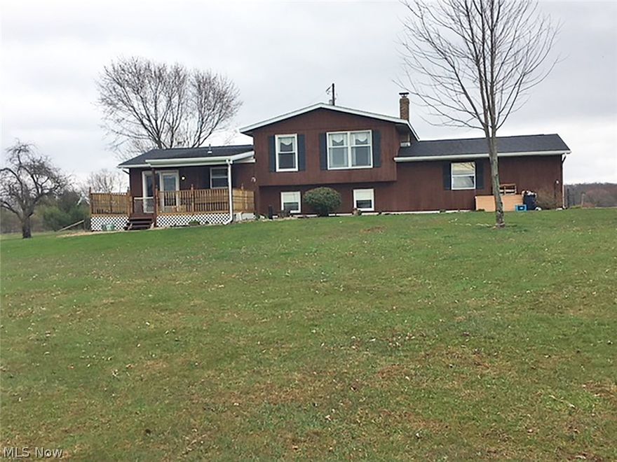 ESTATE AUCTION - 6.5 Acres With Fantastic Hilltop Setting - 3 Bedrooms - 2 Full Baths - To settle the Darla Dee Burris Estate, Stark Co. Case #230956, all sells on location: THURSDAY - MAY 17, 2018 - 4:00 PM, REAL ESTATE SELLS AT 5:15 PM - Real estate features 1,716 sq. ft. split-level home built in 1985. Shingle roof, T-III siding and attached two-car garage. Lower level has family room with brick hearth for pellet burning stove, bedroom and shower bath. Main level has kitchen with appliances, living room and dining room with access to rear deck. Full bathroom and two bedrooms up including spacious master with double closets. Partial basement with laundry hook-up, high efficiency propane forced air furnace, central air, breaker electric, drilled well and septic. 18' X 20' all metal garage with roll-up door and man door, concrete and electric. 24' X 40' pole building with metal roof and siding, concrete floor, water, electric, sliding door, two main doors and two horse stalls. Two wove