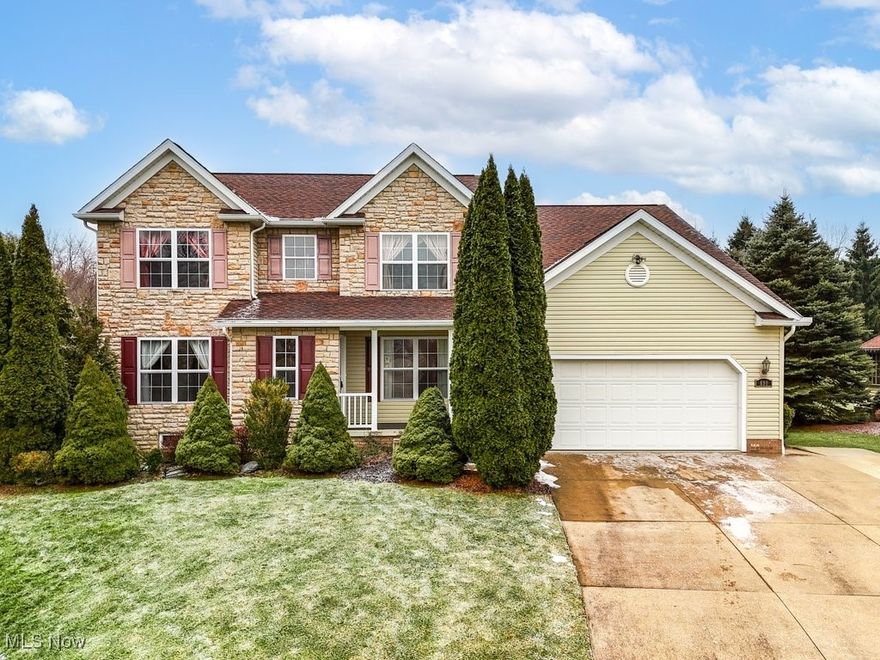 Located in the highly desirable River Bend community of Kent, this spacious 6BD/3.5BA residence offers an abundance of living space for a variety of living arrangements. At the entrance is a clever vestibule designed to help protect the home from the elements. The main level features a den/bonus room (that could double as a 7th bedroom), a convenient 1/2 bath, and an open living/dining room perfect for entertaining. The updated eat-in kitchen includes granite counters, pull-out cabinets, a pantry, stainless appliances and ceramic floors that extend through the laundry/mudroom to the attached 2-car garage. Adjacent to the kitchen is a cozy sunroom, featuring a skylight, views of the backyard, and easy access to the deck. The family room, with its inviting gas fireplace, provides a perfect gathering spot. Upstairs, the master suite offers a retreat featuring vaulted ceilings, walk-in closet, and bath with dual sink vanity and walk-in shower. 3 additional bedrooms on this level each offer generous closet space (two w/walk-in closets), and a guest bathroom. Almost 100% finished, the walk-out basement is a standout feature designed for versatility. It includes a large recreation room, 2 additional bedrooms, and a fully equipped kitchen with appliances—perfect for an in-law suite or independent living space. Outdoor enthusiasts will appreciate the large .6 acre backyard with raised gardens and easy access to River Bend Park, ideal to launch a kayak or canoe into the Cuyahoga River. Additional updates include a roof (2023) and a H2O heater (2018). This exceptional one-owner home is conveniently located less than a mile from Theodore Roosevelt High and Stanton Middle Schools and just minutes from downtown Kent, Route 43, and the Ohio Turnpike. With its spacious layout, thoughtful updates, and unparalleled location, this home offers a rare opportunity to enjoy both privacy and easy access to local amenities. Make an appointment with your favorite realtor today!