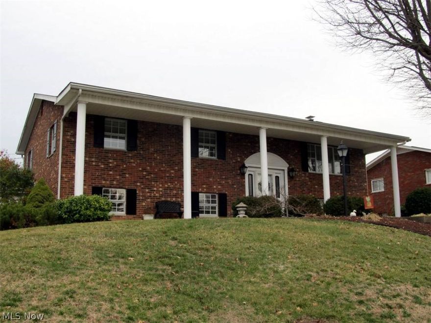 Lovely four bedroom, three bath brick split level on large corner lot offers move-in ready condition. Features over 2500+ finished square feet, gorgeous inground pool, privacy fence and large inviting deck screened porch is your get away place.  Pride of ownership shows!  Professional landscaping adorns.  Two car garage, pool house, full finished lower level and the storage is amazing.  Priced to sell.  This one won't last long!