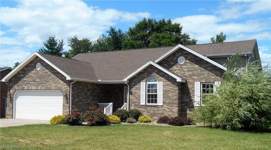 Beautiful brick home in Mineral Wells all 1st floor living, 2 stall garage, large flat back yard with a deck overlooking. Vaulted ceilings, great house & location. Call today for your private showing.