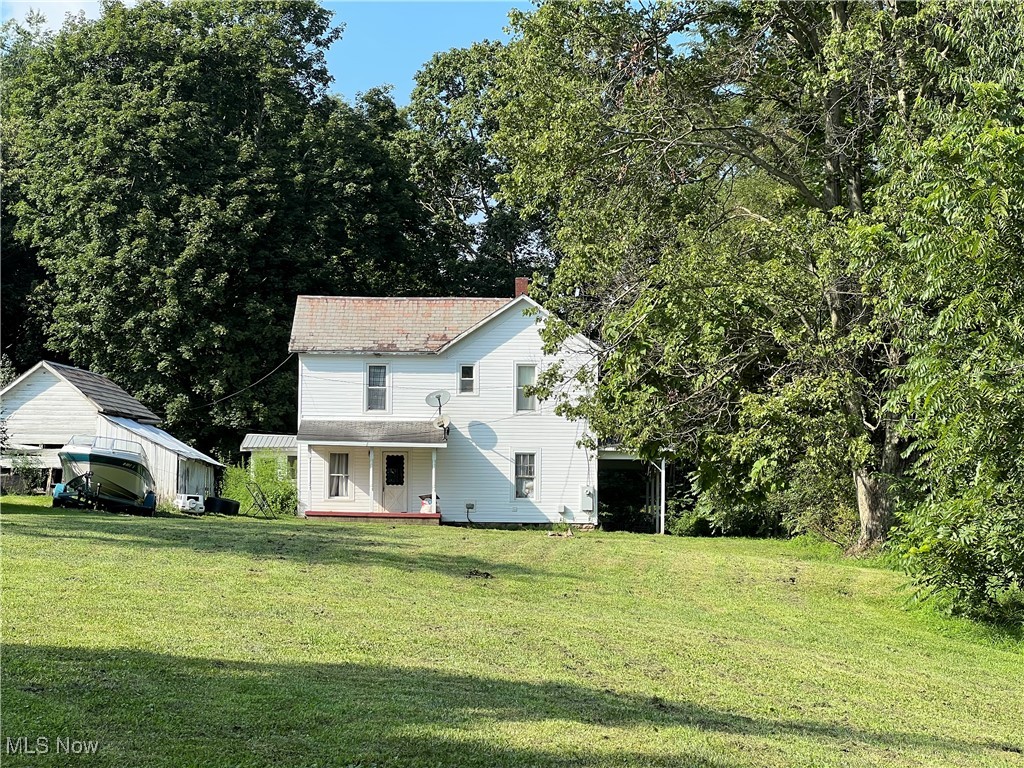 Farmhouse on 5.127 Acres – Home is perfectly positioned on this quaint 5+ acres with a back drop of woods and nature. This property is ideal for enjoying country living at its finest. The possibilities are endless; gardening, hunting, outdoors activities, entertaining, mini farming, etc. Take a little stroll in the woods on the peaceful path that leads to all that nature has to offer and plenty of room to roam. Home is conveniently located just minutes from SR 36. The home needs work—ideal as a fixer-upper or investment opportunity. Here is your opportunity to create a little piece of heaven with all of your own finishing touches. Call for a private showing today.