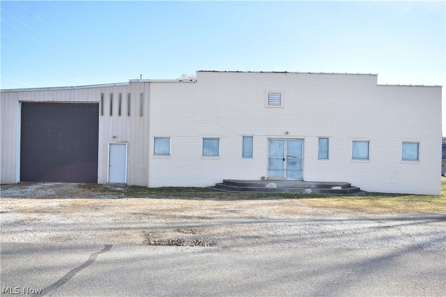 This would be a great industrial site for small manufacturer or for a large storage facility.  The property was previously used a pottery manufacturer.  The building features its own well and septic system, but could easily be connected into the city's water if so desired.  Property features 4 parcels, 1 loading dock and 2 other overhead doors 14 x 12 and 16 x 14, 2 operational bathrooms, gas heat with A/C for part of the building.  Space could be used for industrial, retail or warehouse.  Building sits on over and 1/2 acre with plenty of room for parking or expansion.