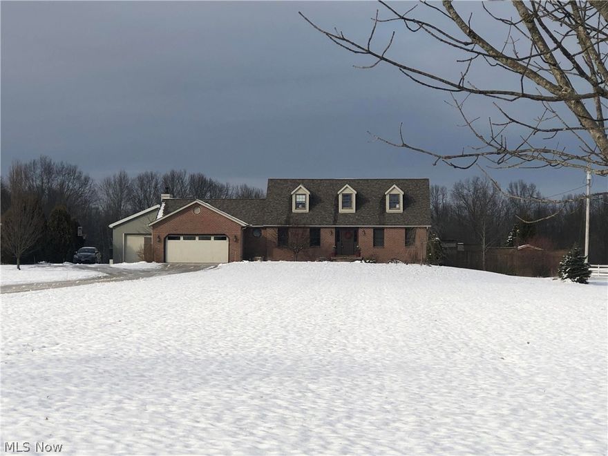 Bring your collector cars, 4 wheelers, dirt bikes, horses, what have you.  This property is versatile to the max!  Over 5 acres surrounds this beautiful 3 BR, 2.5 BA cape in the country.  Home features large first floor master BR, with walk-in closet and beautifully, and recently remodeled master bath.  Very nice family room with wood burning fireplace, adjoining the beautiful eat-in kitchen, w/center island and ample cabinets.  There is a formal dining room and the formal living room is currently being used as an office.  Upstairs hosts 2 large dormered bedrooms, and a full bath.  In the lower level of the home you will enjoy the beautifully laid out recreation room.  Currently, sellers are using one room in the lower level as a bedroom.   Oh!  Don't forget the home has a newer roof (40 year shingles) and the FABULOUS approximately 28 x 72 'to die for' heated outbuilding!  Includes overhang for gatherings.  The above ground pool was used last summer, however, seller says although liner does not leak, it and the pump need replacing.  After all that, you can relax in the hot tub located on the rear deck and have not a care because the seller is offering a home warranty with your purchase.

All of this close to West Branch, Berlin Lake, and Lake Milton State Park includes fishing, boating, hunting recreation.