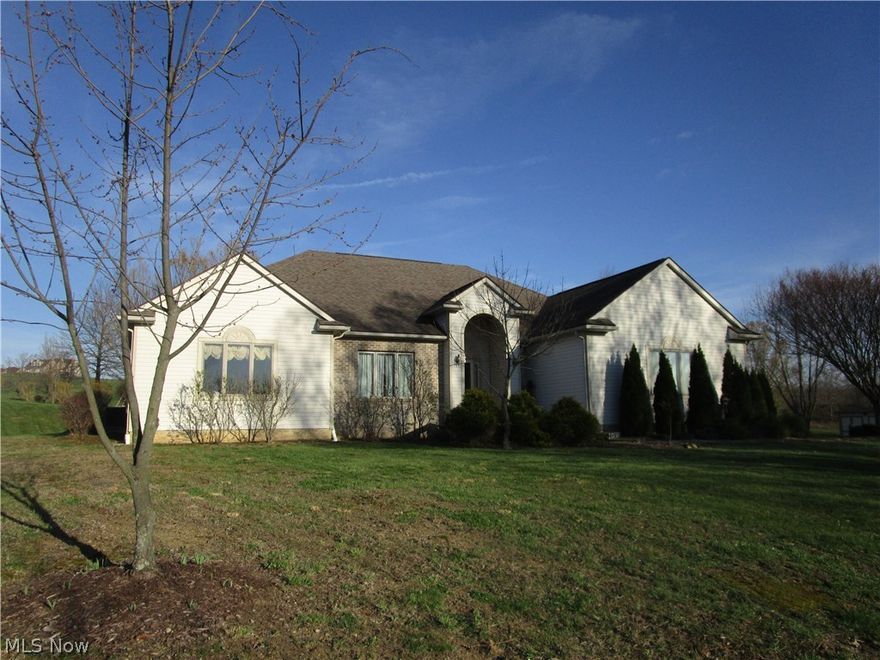 Large 2390 square foot ranch on 1.75 acres- just what you have been looking for! Open floor plan, large bedrooms. Bedroom #4 & 5 are in lower level.  Neutral colors, 9 ft ceilings, tray ceiling, jetted tub in master, family room in lower level, lovely yard with rear deck...so close to Barkcamp Park and I 70.