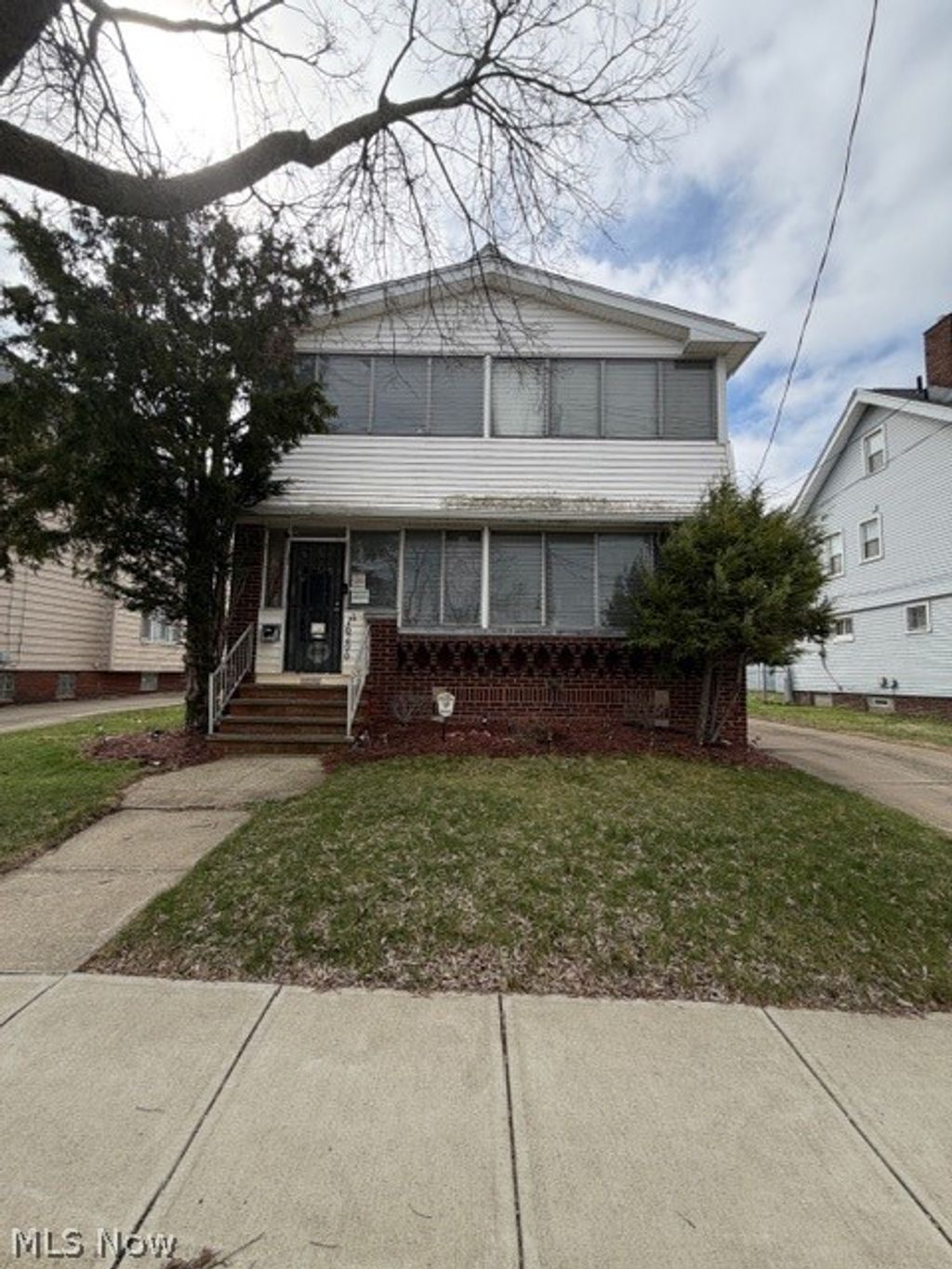 Photo of 16206 Grovewood Avenue, Cleveland, OH 44110 (MLS # 5195152)