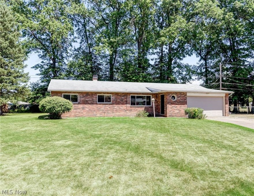 SWEET! Enjoy comfortable one-floor living in this charming ranch home! Open floorplan with L-shaped living and dining room provides lovely views of yard and soothing natural light! Oh - how you will love preparing meals in the efficient, newly remodeled kitchen - with new stainless steel appliances and beautiful ceramic tile floors!  And - how nice - it is open to the cozy, lodge-style family room, easy access to back patio with the wooded view! Perfect for relaxing, reading, casual meals ... and watching the seasons change before your eyes...  Easy to care for laminate flooring throughout. Laundry room off of the family room... You will have plenty of closet space in the three bedrooms! Freshly painted, inside and out. Newer windows!  Two car attached garage is a big plus - no more running through the rain and snow with bags of groceries! Lovely cul-de-sac street, convenient location, close to shopping, freeways, medical etc. etc.! Don't wait - see it now!