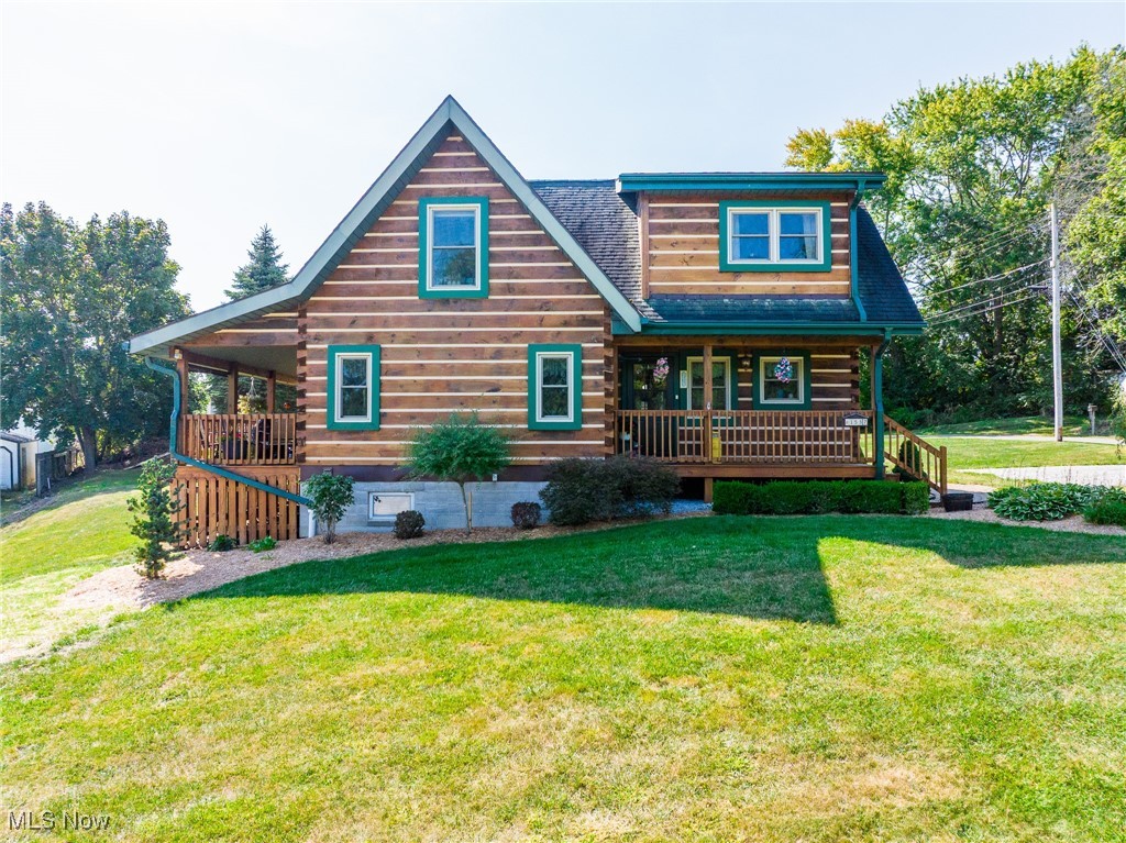 Located on 0.4 acres, this cozy two-story log cabin combines rustic character and comfort in its 1,285 S.F. of living space. Inside, the main floor features a warm and inviting living room and kitchen with exposed wood beams, creating that classic cabin charm. Upstairs, you’ll find two bedrooms and a full bath, while the basement provides laundry hookups and plenty of storage space. The home is equipped with natural gas forced air heat, central A/C, a natural gas hot water heater, water softener system, and city water and sewer for worry-free living. Step outside to enjoy three decks—two of them covered—perfect for relaxing or entertaining outdoors. A small storage shed adds convenience for tools and equipment. If you’ve been looking for a home with character, comfort, and a touch of rustic style, this Ashland log cabin is a must-see!