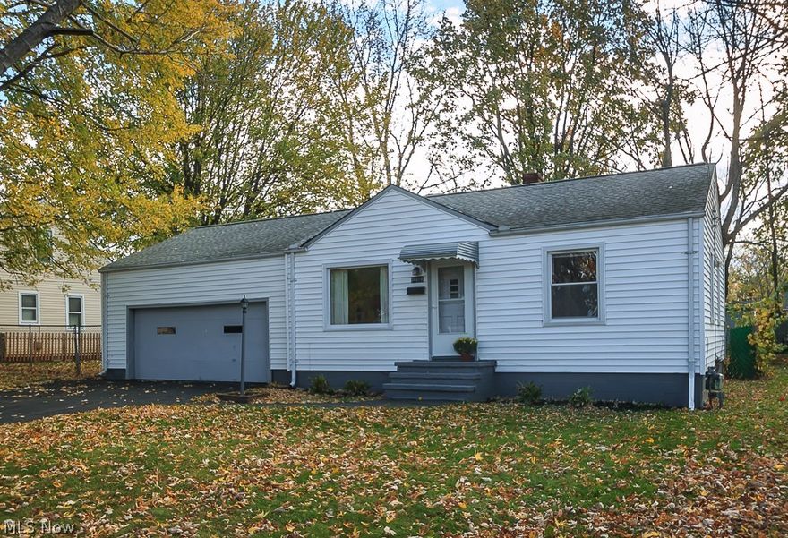 This two-bedroom ranch home in a peaceful residential neighborhood is pristine and move-in ready! The immaculate condition along with the upgrades makes it stand out above the rest. Plenty of character with rounded entryways, hard wood floors, solid wood doors and built-ins. Living room and oversized family room with knotty pine walls are great for family gatherings. Large backyard offers endless possibilities with plenty of space for play and additional storage! Oversized 2 car attached garage. Upgrades include: electrical box (2016), front screen door (2016), family room carpet (2016), hot water tank (2011), bathroom (2010), furnace (2007), complete roof tear off (2006), windows (2006 & 2010). Don't miss a wonderful opportunity!