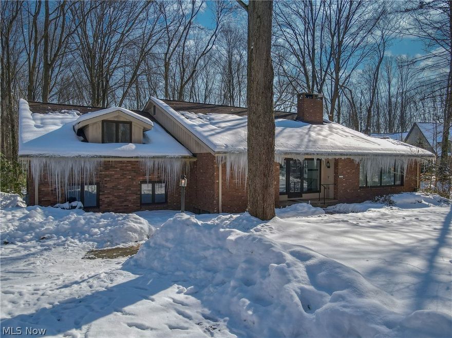 Impeccable setting in a fabulous neighborhood! Pebblebrook in Moreland Hills, off SOM Center across from Chagrin Valley Country Club!  Older home being sold  by original owners...for sale 'as is.'  Great spaces for a buyer who likes a wooded yard, a cul de sac setting, in this lovely luxury neighborhood!  Septic system inspected and approved by Cuyahoga County Health Dept.  Excellent value. Square footage and acreage are per the county auditor web site.