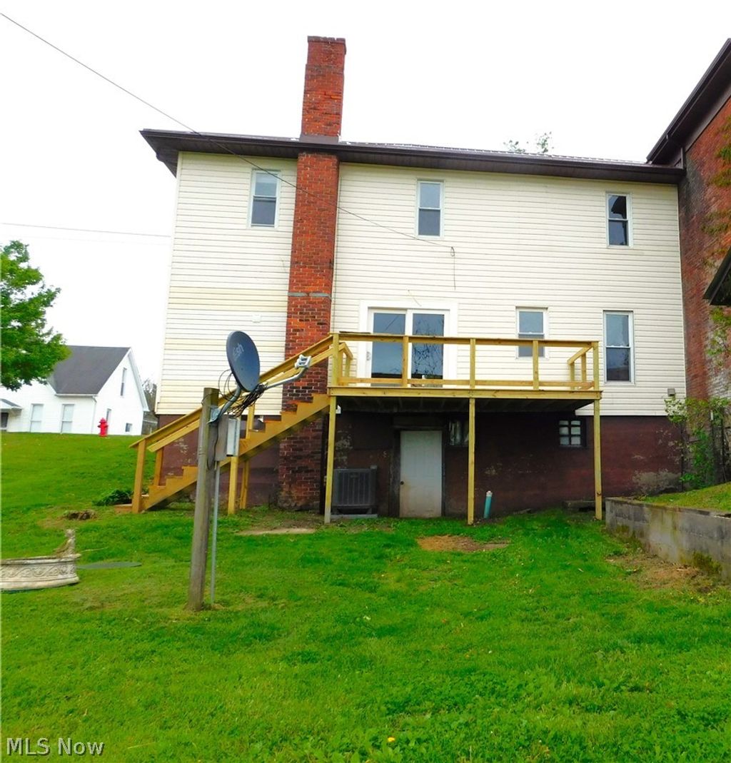 Photo of 211 Main Pike Street, Quaker City, OH 43773 (MLS # 5204472)