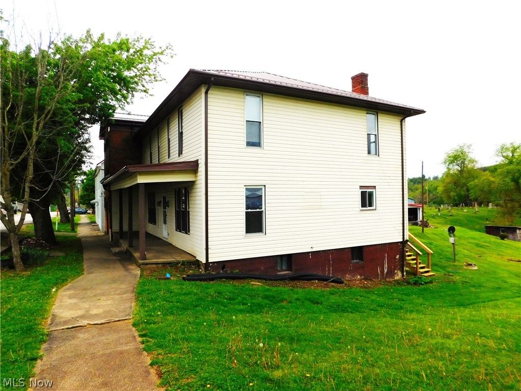 Photo of 211 Main Pike Street, Quaker City, OH 43773 (MLS # 5204472)